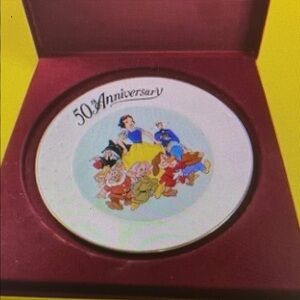 commemorative collector's plate celebrating the 50th anniversary of Disney's Sno